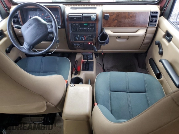 2001 Jeep Wrangler Sahara z VIN 1J4FA59SX1P305100, wystawiony jako Copart lot #58606685 z przebiegiem 76 856 mil mil oraz Czysty tytuł • Clean title. Historia ofert i sprzedaży dostępna na DreamBid. Obrazek 8.