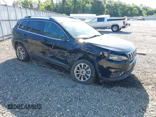 2019 Jeep Cherokee Latitude Plus z VIN 1C4PJMLBXKD229927, wystawiony jako IAAI lot #42238552 z przebiegiem 90 984 mil mil oraz . Historia ofert i sprzedaży dostępna na DreamBid. Obrazek 1.