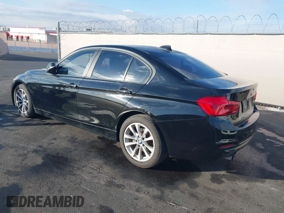 2017 BMW 3 Series 320i with VIN WBA8E1G50HNU14516, listed as a IAAI auction lot 41433532 with 119,742 mi miles. Bid and sale history available at carsss.com. Image 3.