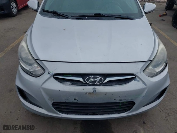 2012 Hyundai Accent GLS with VIN KMHCT4AE7CU181676, listed as a IAAI auction lot 41539969 with 161,419 mi miles. Bid and sale history available at carsss.com. Image 12.