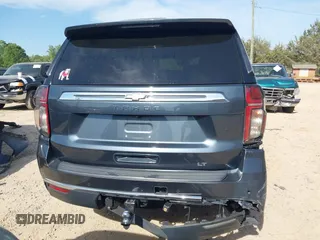 2021 Chevrolet Tahoe LT z VIN 1GNSKNKD4MR250981, wystawiony jako IAAI lot #42092550 z przebiegiem 89 414 mil mil oraz . Historia ofert i sprzedaży dostępna na DreamBid. Obrazek 16.
