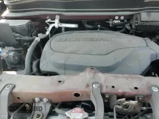 2021 Honda Pilot EX-L z VIN 5FNYF6H58MB079154, wystawiony jako Copart lot #67792655 z przebiegiem 36 460 mil mil oraz Szkoda całkowita • Salvage title. Historia ofert i sprzedaży dostępna na DreamBid. Obrazek 14.