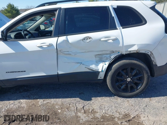 2014 Jeep Cherokee Latitude with VIN 1C4PJMCS9EW309289, listed as a IAAI auction lot 42003252 with 99,360 mi miles and . Bid and sale history available at DreamBid. Image 6.