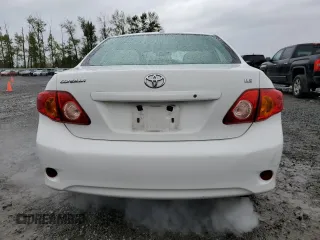 2010 Toyota Corolla with VIN 1NXBU4EE6AZ232052, listed as a Copart auction lot 54074815 with 200,812 mi miles and Clean Title. Bid and sale history available at carsss.com. Image 6.