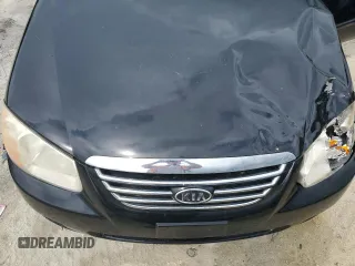 2007 Kia Spectra EX with VIN KNAFE121575466606, listed as a Copart auction lot 72697584 with 91,619 mi miles and Salvage Title. Bid and sale history available at carsss.com. Image 11.