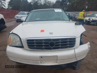 2002 Cadillac DeVille DHS z VIN 1G6KE57YX2U212020, wystawiony jako IAAI lot #41287342 z przebiegiem Nie podano mil oraz . Historia ofert i sprzedaży dostępna na DreamBid. Obrazek 12.