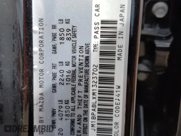 2021 Mazda 3 Select with VIN JM1BPABLXM1323702, listed as a Copart auction lot 58871235 with 84,298 mi miles and Salvage title. Bid and sale history available at DreamBid. Image 12.