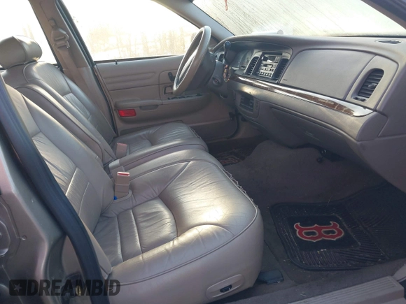 2002 Ford Crown Victoria LX z VIN 2FAFP74W32X159473, wystawiony jako IAAI lot #41759610 z przebiegiem 86 523 mil mil oraz . Historia ofert i sprzedaży dostępna na DreamBid. Obrazek 5.