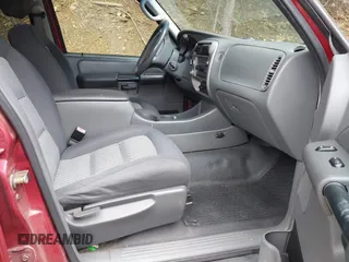 2004 Ford Explorer Sport Trac XLS z VIN 1FMZU77K64UA53405, wystawiony jako IAAI lot #42360657 z przebiegiem Nie podano mil oraz . Historia ofert i sprzedaży dostępna na DreamBid. Obrazek 5.