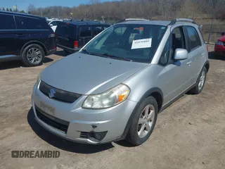 2009 Suzuki SX4 Touring AWD with VIN JS2YB417295100879, listed as a IAAI auction lot 41979405 with 69,625 mi miles and . Bid and sale history available at DreamBid. Image 2.