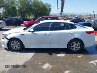 2016 Kia Optima LX with VIN 5XXGT4L3XGG054286, listed as a IAAI auction lot 41924937 with 146,555 mi miles. Bid and sale history available at carsss.com. Image 14.