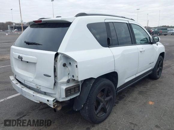 2016 Jeep Compass Latitude with VIN 1C4NJCEA3GD735161, listed as a IAAI auction lot 40881008 with 126,384 mi miles. Bid and sale history available at carsss.com. Image 4.