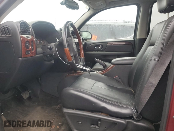 2006 GMC Envoy Denali with VIN 1GKES63M562341669, listed as a Copart auction lot 83590824 with 177,663 mi miles and Clean Title. Bid and sale history available at carsss.com. Image 7.