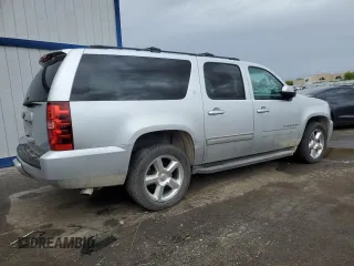 2013 Chevrolet Suburban LT with VIN 1GNSCJE07DR305437, listed as a Copart auction lot 55346605 with 160,518 mi miles and Salvage title. Bid and sale history available at DreamBid. Image 3.