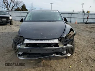 2025 Tesla Model Y Long Range z VIN 7SAYGDEE7SF288570, wystawiony jako Copart lot #48596345 z przebiegiem 4 366 mil mil oraz Szkoda całkowita • Salvage title. Historia ofert i sprzedaży dostępna na DreamBid. Obrazek 5.
