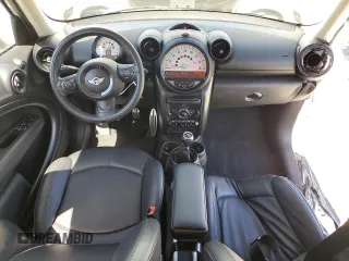2013 MINI Countryman S ALL4 z VIN WMWZC5C56DWM16296, wystawiony jako Copart lot #56985615 z przebiegiem 63 858 mil mil oraz Szkoda całkowita • Salvage title. Historia ofert i sprzedaży dostępna na DreamBid. Obrazek 8.