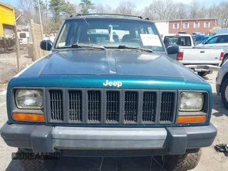 1998 Jeep Cherokee Sport with VIN 1J4FJ68S6WL151698, listed as a IAAI auction lot 42100846 with 239,466 mi miles. Bid and sale history available at carsss.com. Image 6.