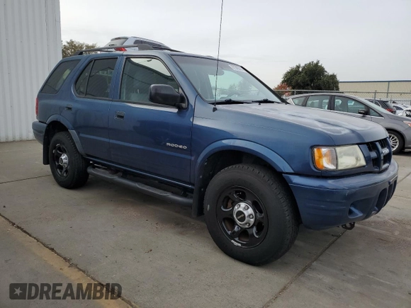 2003 Isuzu Rodeo z VIN 4S2DM58W234305979, wystawiony jako Copart lot #81346314 z przebiegiem 177 272 mil mil oraz Szkody całkowita. Historia ofert i sprzedaży dostępna na DreamBid. Obrazek 4.