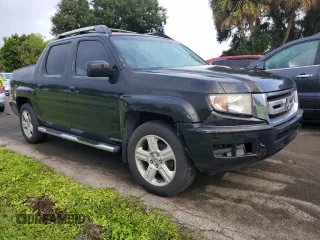 2010 Honda Ridgeline RTL with VIN 5FPYK1F5XAB010390, listed as a Copart auction lot 75039634 with 0 mi miles and Salvage Title. Bid and sale history available at carsss.com. Image 4.