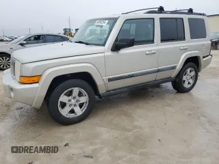 2007 Jeep Commander Sport z VIN 1J8HG48K87C690867, wystawiony jako Copart lot #84095254 z przebiegiem 175 586 mil mil oraz Szkoda całkowita • Salvage title. Historia ofert i sprzedaży dostępna na DreamBid. Obrazek 1.