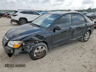 2009 Kia Spectra EX with VIN KNAFE221395595744, listed as a Copart auction lot 58220445 with 154,388 mi miles and Salvage title. Bid and sale history available at DreamBid. Image 1.
