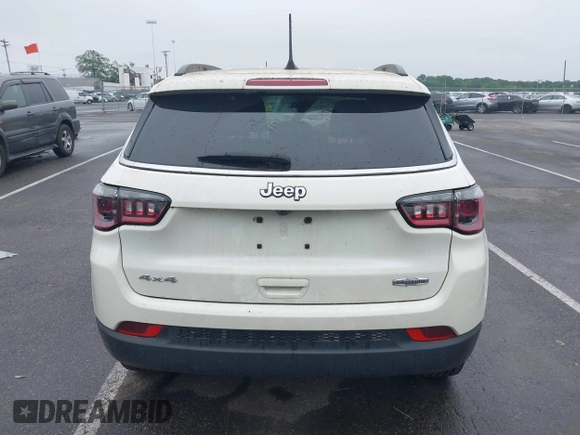 2021 Jeep Compass Latitude with VIN 3C4NJDBB6MT537568, listed as a IAAI auction lot 42528180 with 74,003 mi miles and . Bid and sale history available at DreamBid. Image 16.