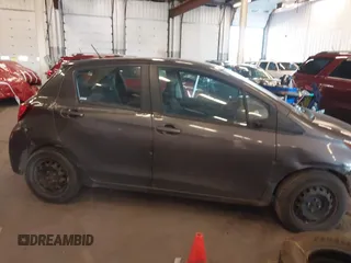 2015 Toyota Yaris L with VIN VNKKTUD36FA049550, listed as a IAAI auction lot 41671226 with 129,540 mi miles. Bid and sale history available at carsss.com. Image 13.