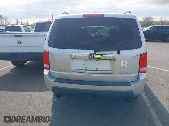 2011 Honda Pilot EX-L with VIN 5FNYF4H68BB017361, listed as a IAAI auction lot 41933024 with 338,819 mi miles and . Bid and sale history available at carsss.com. Image 14.