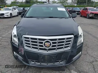 2013 Cadillac XTS Luxury with VIN 2G61P5S33D9215214, listed as a IAAI auction lot 42170402 with 132,045 mi miles and . Bid and sale history available at DreamBid. Image 12.