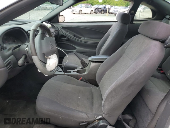2003 Ford Mustang Standard с VIN 1FAFP40433F330822, выставлен на аукционе Copart как лот 57473325 с пробегом 170 282 миль миль и Списание • Salvage title. История ставок и продаж доступна на DreamBid. Изображение 7.