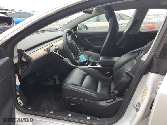 2019 Tesla Model 3 Mid Range with VIN 5YJ3E1EA7KF317543, listed as a Copart auction lot 83594454 with 58,550 mi miles and Non Repairable. Bid and sale history available at carsss.com. Image 7.