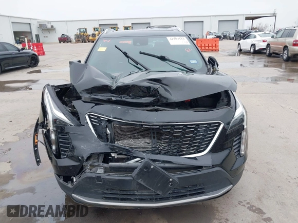 2020 Cadillac XT4 AWD Premium Luxury z VIN 1GYFZDR47LF122394, wystawiony jako IAAI lot #41703115 z przebiegiem 69 366 mil mil oraz . Historia ofert i sprzedaży dostępna na DreamBid. Obrazek 12.