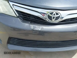 2014 Toyota Camry L with VIN 4T4BF1FKXER379158, listed as a IAAI auction lot 42050926 with 88,060 mi miles and . Bid and sale history available at DreamBid. Image 17.
