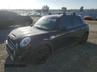 2016 MINI Cooper Hardtop 4 Door S with VIN WMWXU3C55G2D30727, listed as a Copart auction lot 50806725 with 75,636 mi miles and Salvage Title. Bid and sale history available at carsss.com. Image 1.