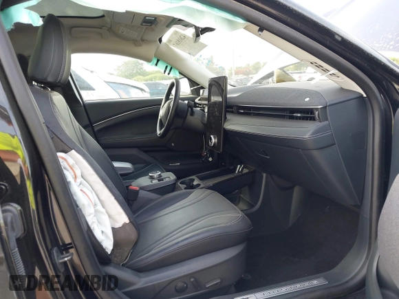 2023 Ford Mustang Mach-E Premium with VIN 3FMTK3SU2PMA97987, listed as a IAAI auction lot 42618167 with 37,904 mi miles and . Bid and sale history available at DreamBid. Image 5.