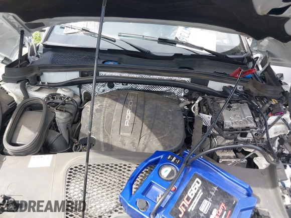 2019 Porsche Macan z VIN WP1AA2A50KLB05922, wystawiony jako IAAI lot #42013711 z przebiegiem Nie podano mil oraz . Historia ofert i sprzedaży dostępna na DreamBid. Obrazek 10.