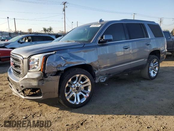 2018 GMC Yukon SLT with VIN 1GKS1BKC9JR338958, listed as a Copart auction lot 43252885 with 80,647 mi miles and Salvage Title. Bid and sale history available at carsss.com. Image 1.