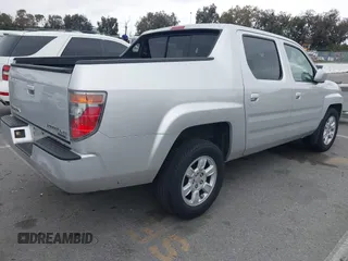 2006 Honda Ridgeline RTL with VIN 2HJYK16566H532598, listed as a IAAI auction lot 42184828 with 91,817 mi miles and . Bid and sale history available at DreamBid. Image 4.