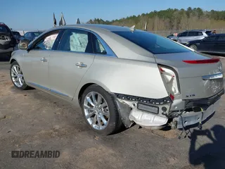 2013 Cadillac XTS Luxury with VIN 2G61P5S39D9172708, listed as a IAAI auction lot 41781371 with 100,173 mi miles. Bid and sale history available at carsss.com. Image 3.