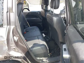 2016 Jeep Compass High Altitude Edition with VIN 1C4NJDEB0GD558230, listed as a IAAI auction lot 39799941 with 57,002 mi miles. Bid and sale history available at carsss.com. Image 8.