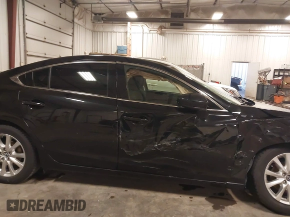 2016 Mazda 6 i Sport with VIN JM1GJ1U57G1433732, listed as a IAAI auction lot 41879844 with 107,269 mi miles and . Bid and sale history available at DreamBid. Image 13.