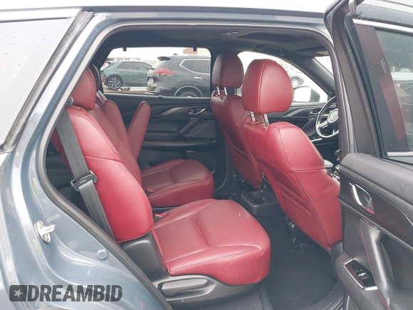 2021 Mazda CX-9 Grand Touring with VIN JM3TCBDY9M0534966, listed as a IAAI auction lot 42166071 with 77,817 mi miles and . Bid and sale history available at DreamBid. Image 8.