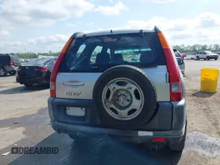 2003 Honda CR-V LX z VIN JHLRD68493C008030, wystawiony jako IAAI lot #42034191 z przebiegiem 290 596 mil mil oraz . Historia ofert i sprzedaży dostępna na DreamBid. Obrazek 16.
