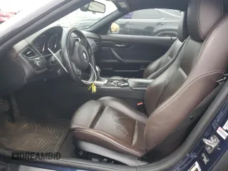 2012 BMW Z4 sDrive35i with VIN WBALM7C56CE384825, listed as a Copart auction lot 53083945 with 87,474 mi miles and Salvage Title. Bid and sale history available at carsss.com. Image 7.