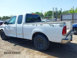 2001 Ford F-150 z VIN 1FTPX17LX1KB15016, wystawiony jako IAAI lot #42320637 z przebiegiem 567 424 mil mil oraz . Historia ofert i sprzedaży dostępna na DreamBid. Obrazek 15.