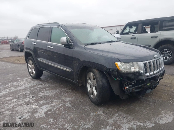2012 Jeep Grand Cherokee Overland with VIN 1C4RJFCT9CC182216, listed as a IAAI auction lot 41490446 with 153,237 mi miles. Bid and sale history available at carsss.com. Image 1.