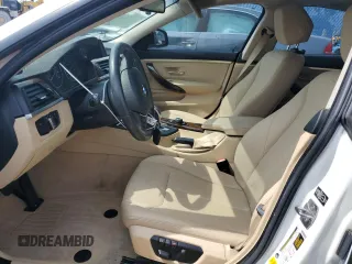 2015 BMW 4 Series 428i with VIN WBA4A9C59FGL85999, listed as a Copart auction lot 56275455 with 105,961 mi miles and Salvage title. Bid and sale history available at DreamBid. Image 7.