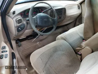 1999 Ford F-150 XL with VIN 1FTRX18L4XNB84248, listed as a Copart auction lot 52798555 with 204,943 mi miles and Salvage title. Bid and sale history available at DreamBid. Image 8.