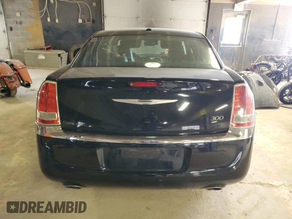 2014 Chrysler 300 z VIN 2C3CCAAG6EH136453, wystawiony jako Copart lot #41767885 z przebiegiem Nie podano mil oraz Szkoda całkowita • Salvage title. Historia ofert i sprzedaży dostępna na DreamBid. Obrazek 6.