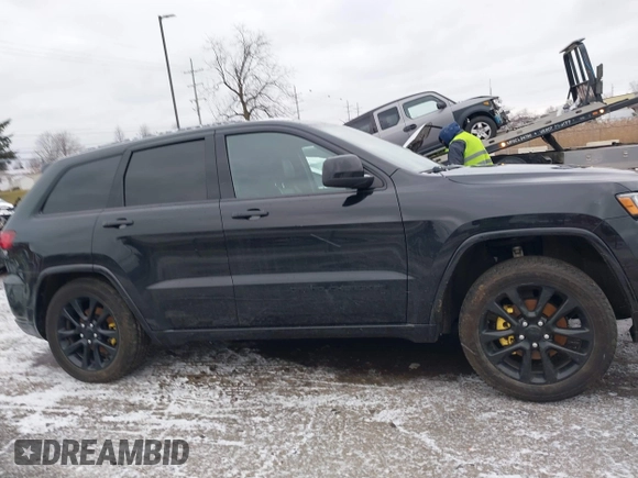 2020 Jeep Grand Cherokee Altitude with VIN 1C4RJFAG1LC225243, listed as a IAAI auction lot 41236515 with 93,343 mi miles. Bid and sale history available at carsss.com. Image 13.